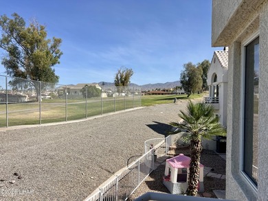 Enjoy golf course living in this second-floor condo overlooking on London Bridge Golf Course in Arizona - for sale on GolfHomes.com, golf home, golf lot