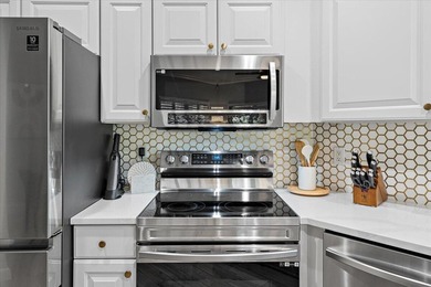 Stunning, fully upgraded ground-floor in highly sought-after on The Legacy Golf and Tennis Club in Florida - for sale on GolfHomes.com, golf home, golf lot