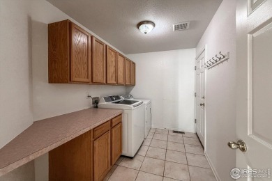 Bright, open and fresh in sought after Broadlands Community. On on The Broadlands Golf Course in Colorado - for sale on GolfHomes.com, golf home, golf lot