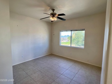 Enjoy golf course living in this second-floor condo overlooking on London Bridge Golf Course in Arizona - for sale on GolfHomes.com, golf home, golf lot