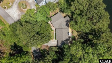 Welcome to 48 Ginguite Trail, a charming one-level ranch-style on Duck Woods Country Club in North Carolina - for sale on GolfHomes.com, golf home, golf lot