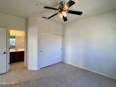 Enjoy golf course living in this second-floor condo overlooking on London Bridge Golf Course in Arizona - for sale on GolfHomes.com, golf home, golf lot