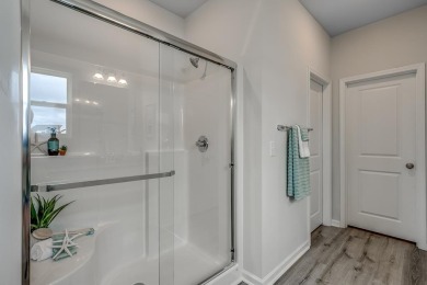 Your spacious cottage awaits in the Gwinnett C Floorplan.  This on Players Course At Wyboo Plantation in South Carolina - for sale on GolfHomes.com, golf home, golf lot