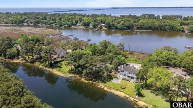 Welcome to 48 Ginguite Trail, a charming one-level ranch-style on Duck Woods Country Club in North Carolina - for sale on GolfHomes.com, golf home, golf lot