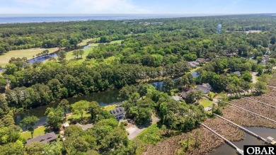 Welcome to 48 Ginguite Trail, a charming one-level ranch-style on Duck Woods Country Club in North Carolina - for sale on GolfHomes.com, golf home, golf lot