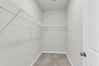 Your spacious cottage awaits in the Gwinnett C Floorplan. This on Players Course At Wyboo Plantation in South Carolina - for sale on GolfHomes.com, golf home, golf lot