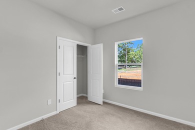 Your spacious cottage awaits in the Gwinnett C Floorplan. This on Players Course At Wyboo Plantation in South Carolina - for sale on GolfHomes.com, golf home, golf lot