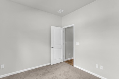 Your spacious cottage awaits in the Gwinnett C Floorplan. This on Players Course At Wyboo Plantation in South Carolina - for sale on GolfHomes.com, golf home, golf lot