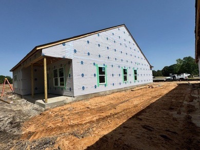 Your spacious cottage awaits in the Gwinnett C Floorplan. This on Players Course At Wyboo Plantation in South Carolina - for sale on GolfHomes.com, golf home, golf lot