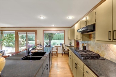 Exceptional Rancher in coveted Manito Place luxury gated on Manito Golf and Country Club in Washington - for sale on GolfHomes.com, golf home, golf lot
