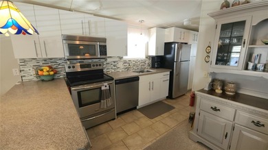 PRICE IMPROVEMENT ON THIS MOVE-IN READY, OPEN CONCEPT MOBILE on River Run Golf Links in Florida - for sale on GolfHomes.com, golf home, golf lot