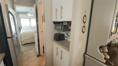 PRICE IMPROVEMENT ON THIS MOVE-IN READY, OPEN CONCEPT MOBILE on River Run Golf Links in Florida - for sale on GolfHomes.com, golf home, golf lot