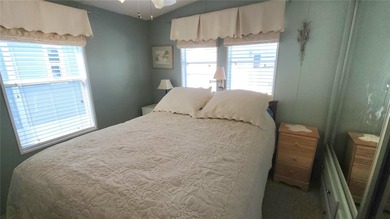 PRICE IMPROVEMENT ON THIS MOVE-IN READY, OPEN CONCEPT MOBILE on River Run Golf Links in Florida - for sale on GolfHomes.com, golf home, golf lot