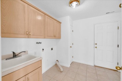 This well maintained home is nestled in the desirable Green on Green Spring Country Club in Utah - for sale on GolfHomes.com, golf home, golf lot