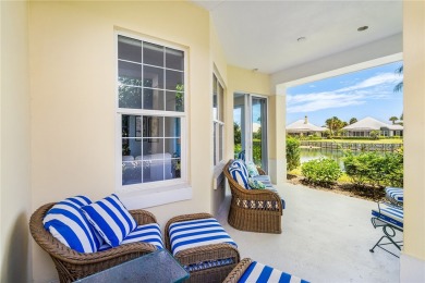 Lovely bright light waterfront villa, with enclosed porch plus on Oak Harbor Country Club in Florida - for sale on GolfHomes.com, golf home, golf lot