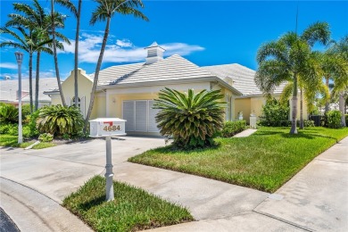 Lovely bright light waterfront villa, with enclosed porch plus on Oak Harbor Country Club in Florida - for sale on GolfHomes.com, golf home, golf lot