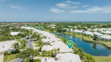 Lovely bright light waterfront villa, with enclosed porch plus on Oak Harbor Country Club in Florida - for sale on GolfHomes.com, golf home, golf lot