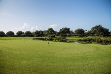 Lovely bright light waterfront villa, with enclosed porch plus on Oak Harbor Country Club in Florida - for sale on GolfHomes.com, golf home, golf lot