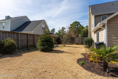 This home is instantly appealing and very well maintained. It on Beau Rivage Golf and Resort in North Carolina - for sale on GolfHomes.com, golf home, golf lot