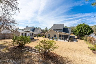 This home is instantly appealing and very well maintained. It on Beau Rivage Golf and Resort in North Carolina - for sale on GolfHomes.com, golf home, golf lot