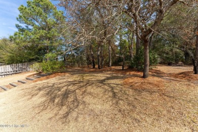 This home is instantly appealing and very well maintained. It on Beau Rivage Golf and Resort in North Carolina - for sale on GolfHomes.com, golf home, golf lot