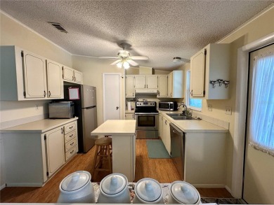 Welcome home to this charming furnished/turnkey 1098sq/ft on Orange Blossom Hills Golf and Country Club in Florida - for sale on GolfHomes.com, golf home, golf lot