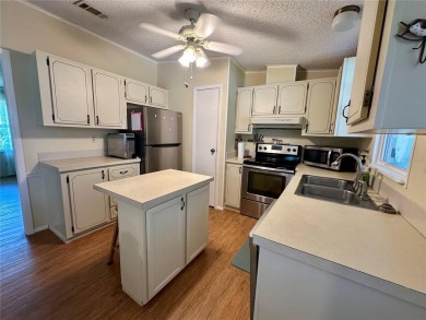 Welcome home to this charming furnished/turnkey 1098sq/ft on Orange Blossom Hills Golf and Country Club in Florida - for sale on GolfHomes.com, golf home, golf lot