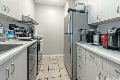 Enjoy breathtaking views from this corner end unit, overlooking on Ala Wai Golf Course in Hawaii - for sale on GolfHomes.com, golf home, golf lot
