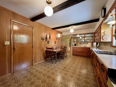 Impeccably maintained mid-century gem, on the market for the on New Berlin Hills Golf Course in Wisconsin - for sale on GolfHomes.com, golf home, golf lot