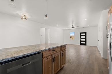Welcome to 133 Chamartin, a stunning custom home ideally located on Tierra Del Sol Golf Course in New Mexico - for sale on GolfHomes.com, golf home, golf lot