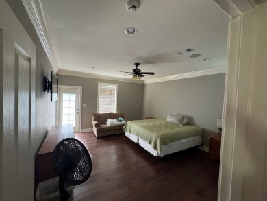 This beautiful 2 story home in Bailey's Bluff isa golf cart ride on Cypress Bend Golf Resort in Louisiana - for sale on GolfHomes.com, golf home, golf lot