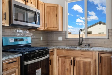 Welcome to 133 Chamartin, a stunning custom home ideally located on Tierra Del Sol Golf Course in New Mexico - for sale on GolfHomes.com, golf home, golf lot