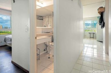 Enjoy breathtaking views from this corner end unit, overlooking on Ala Wai Golf Course in Hawaii - for sale on GolfHomes.com, golf home, golf lot