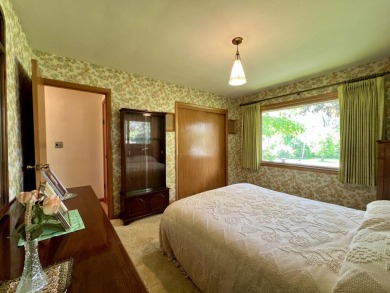 Impeccably maintained mid-century gem, on the market for the on New Berlin Hills Golf Course in Wisconsin - for sale on GolfHomes.com, golf home, golf lot