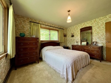 Impeccably maintained mid-century gem, on the market for the on New Berlin Hills Golf Course in Wisconsin - for sale on GolfHomes.com, golf home, golf lot