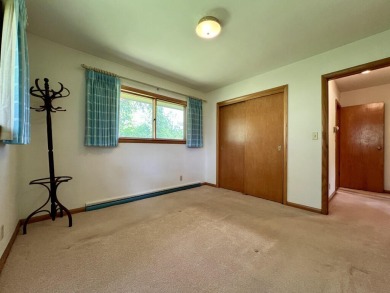Impeccably maintained mid-century gem, on the market for the on New Berlin Hills Golf Course in Wisconsin - for sale on GolfHomes.com, golf home, golf lot
