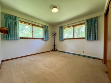 Impeccably maintained mid-century gem, on the market for the on New Berlin Hills Golf Course in Wisconsin - for sale on GolfHomes.com, golf home, golf lot