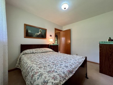 Impeccably maintained mid-century gem, on the market for the on New Berlin Hills Golf Course in Wisconsin - for sale on GolfHomes.com, golf home, golf lot