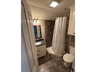 This beautiful 2 story home in Bailey's Bluff isa golf cart ride on Cypress Bend Golf Resort in Louisiana - for sale on GolfHomes.com, golf home, golf lot