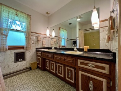 Impeccably maintained mid-century gem, on the market for the on New Berlin Hills Golf Course in Wisconsin - for sale on GolfHomes.com, golf home, golf lot