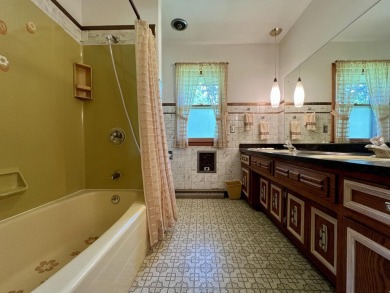 Impeccably maintained mid-century gem, on the market for the on New Berlin Hills Golf Course in Wisconsin - for sale on GolfHomes.com, golf home, golf lot