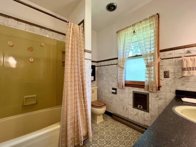 Impeccably maintained mid-century gem, on the market for the on New Berlin Hills Golf Course in Wisconsin - for sale on GolfHomes.com, golf home, golf lot