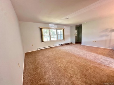 Welcome to this refreshed and move-in ready Baronet model on Leisure Village Golf Course in New York - for sale on GolfHomes.com, golf home, golf lot