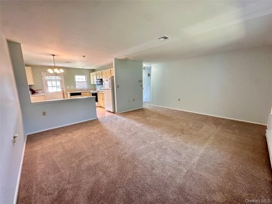 Welcome to this refreshed and move-in ready Baronet model on Leisure Village Golf Course in New York - for sale on GolfHomes.com, golf home, golf lot