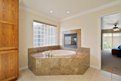 Experience luxury living in this beautifully updated home on Ridgemark Golf and Country Club in California - for sale on GolfHomes.com, golf home, golf lot