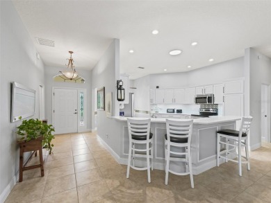 Exceptional 3/2 Concrete, Block and Stucco Designer Gardenia on The Links of Spruce Creek in Florida - for sale on GolfHomes.com, golf home, golf lot