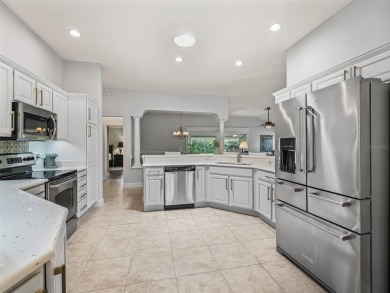 Exceptional 3/2 Concrete, Block and Stucco Designer Gardenia on The Links of Spruce Creek in Florida - for sale on GolfHomes.com, golf home, golf lot