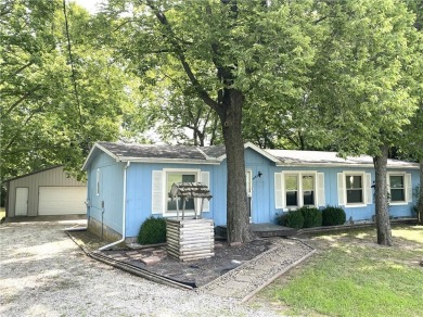 This 3 bedroom, 2 bathroom ranch home is priced to sell. It is on Linn Valley Lakes - Deer Trace Golf Course in Kansas - for sale on GolfHomes.com, golf home, golf lot