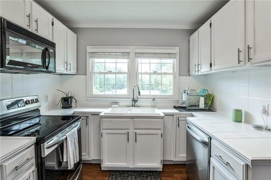 Welcome to this beautifully maintained East Atlanta retreat. A on Charlie Yates Golf Course in Georgia - for sale on GolfHomes.com, golf home, golf lot