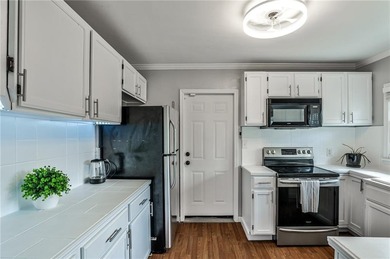 Welcome to this beautifully maintained East Atlanta retreat. A on Charlie Yates Golf Course in Georgia - for sale on GolfHomes.com, golf home, golf lot